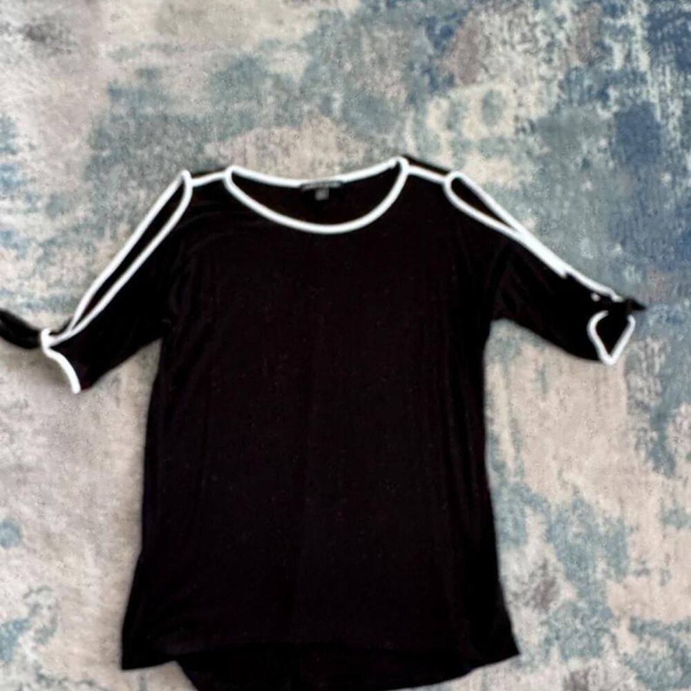 Cable-gauge Women's Black Blouse with white trim, shoulders cut out